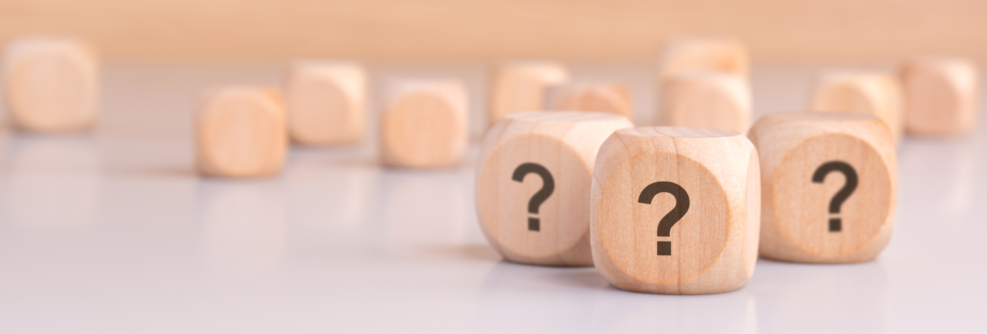 Wooden Cubes With Question Marks 1920X650 (1)
