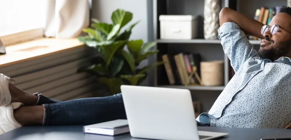 Man Relaxing While Waiting On His Commercial Quote 1920X650